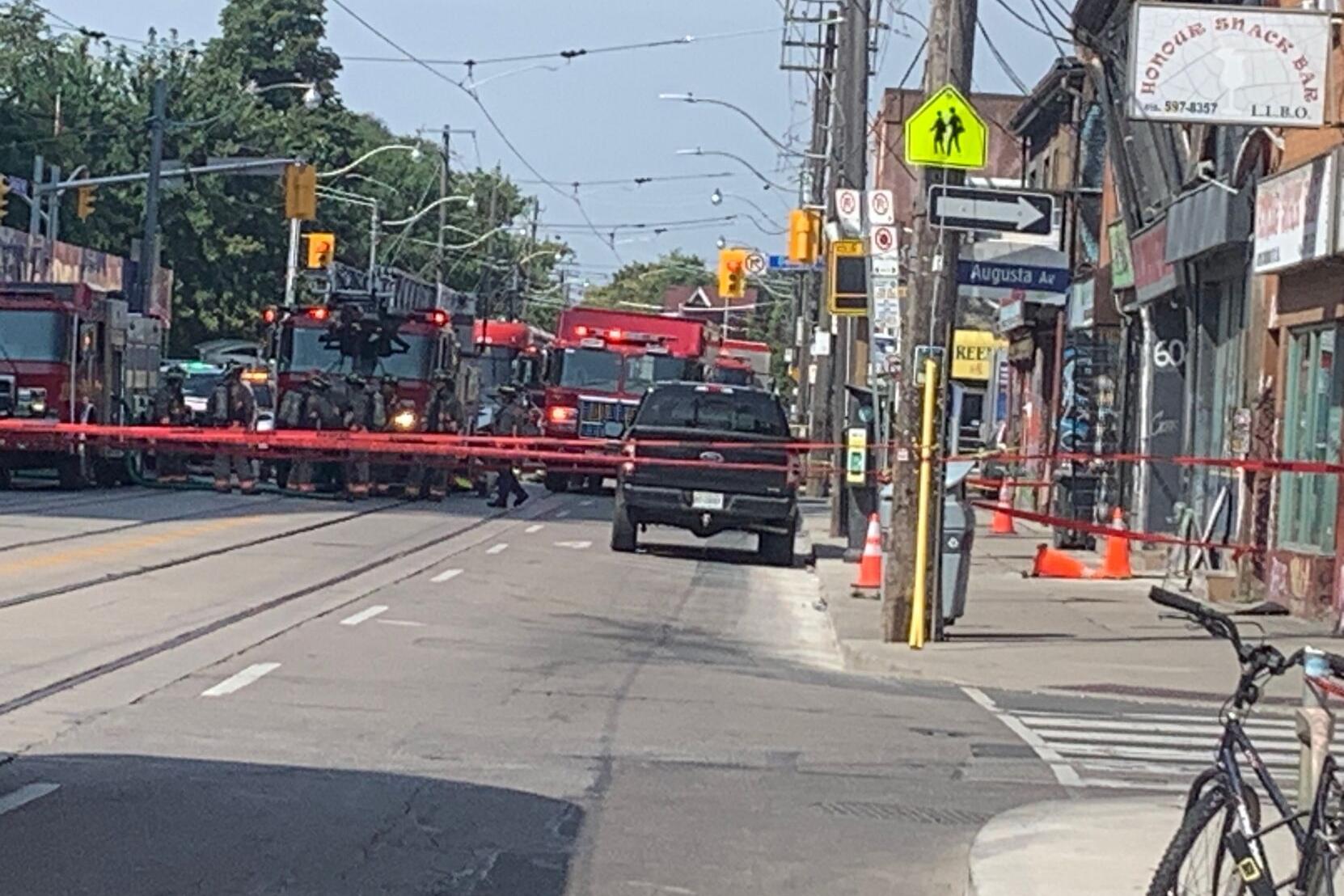 First responders monitoring leaning building near Kensington Market, roads closed